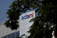 2025-07-17T104420Z_1723953688_RC2H9BAL2KGC_RTRMADP_3_ADANI-DIVESTITURE-AWL.jpg